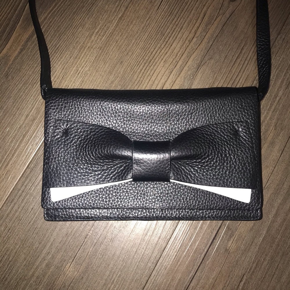 Black and white KATE SPADE crossbody w/ bow detail